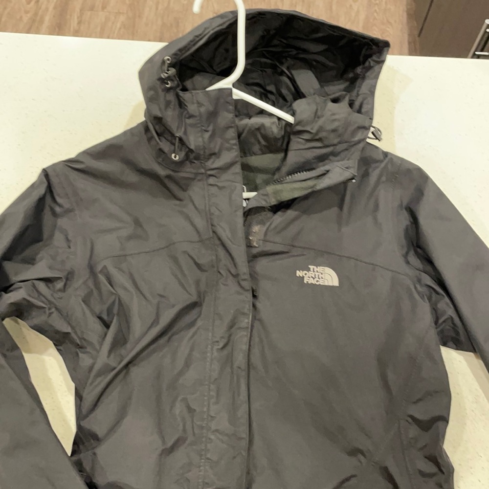North Face cover, great for wind or rain (waterproof) and lightweight.